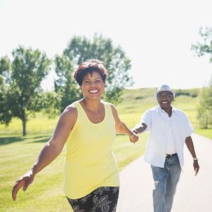 Happy senior couple taking a walk