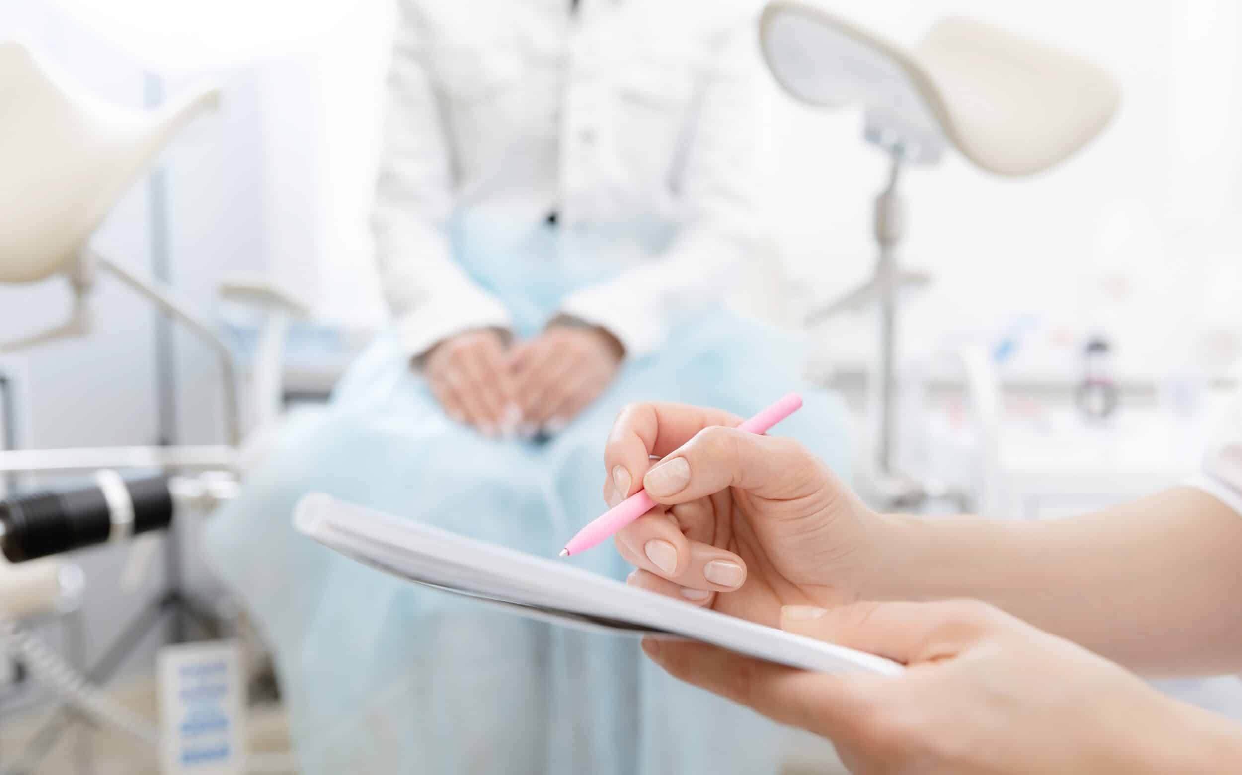 Woman experiences pain in her midsection due to uterine fibroids