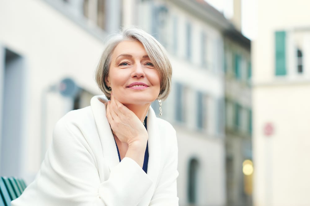 Outdoor,Portrait,Of,Beautiful,And,Elegant,Middle,Age,55, Osteoporosis in Houston, TX